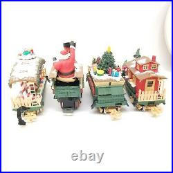 The HOLIDAY EXPRESS New Bright Animated Christmas Train Set #380 1996